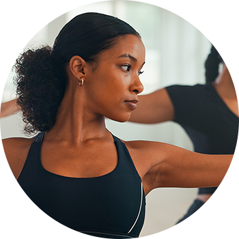 Woman stretching shoulder